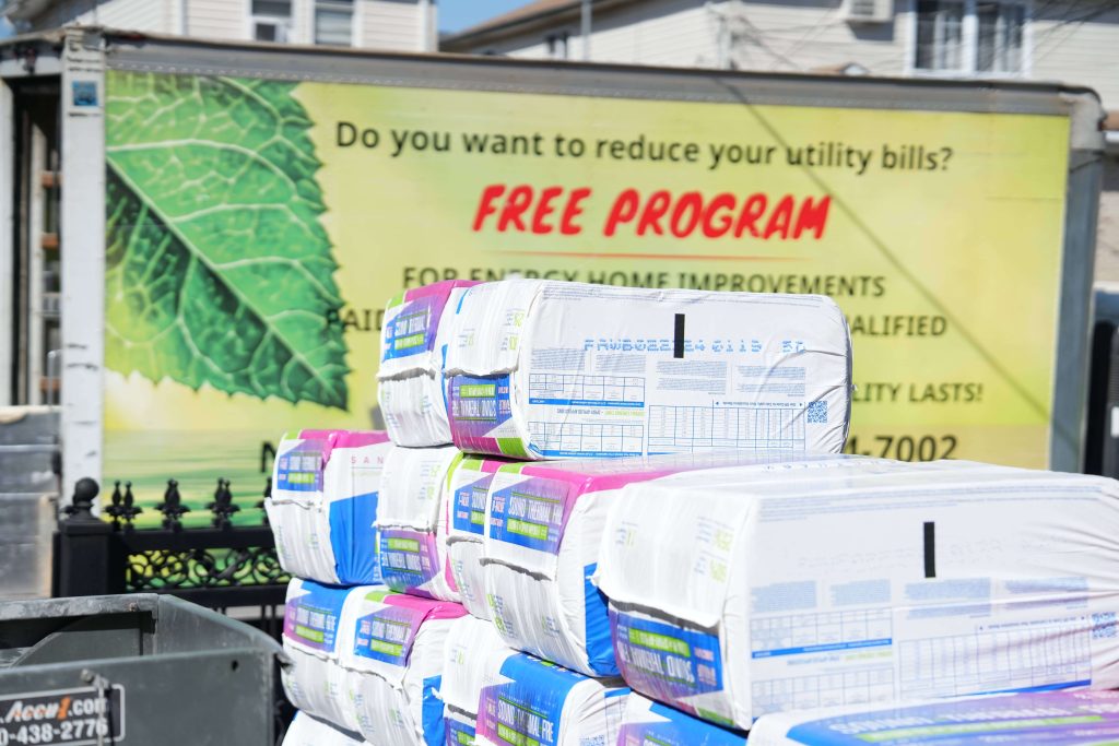 Cellulose insulation packages in front of the truck