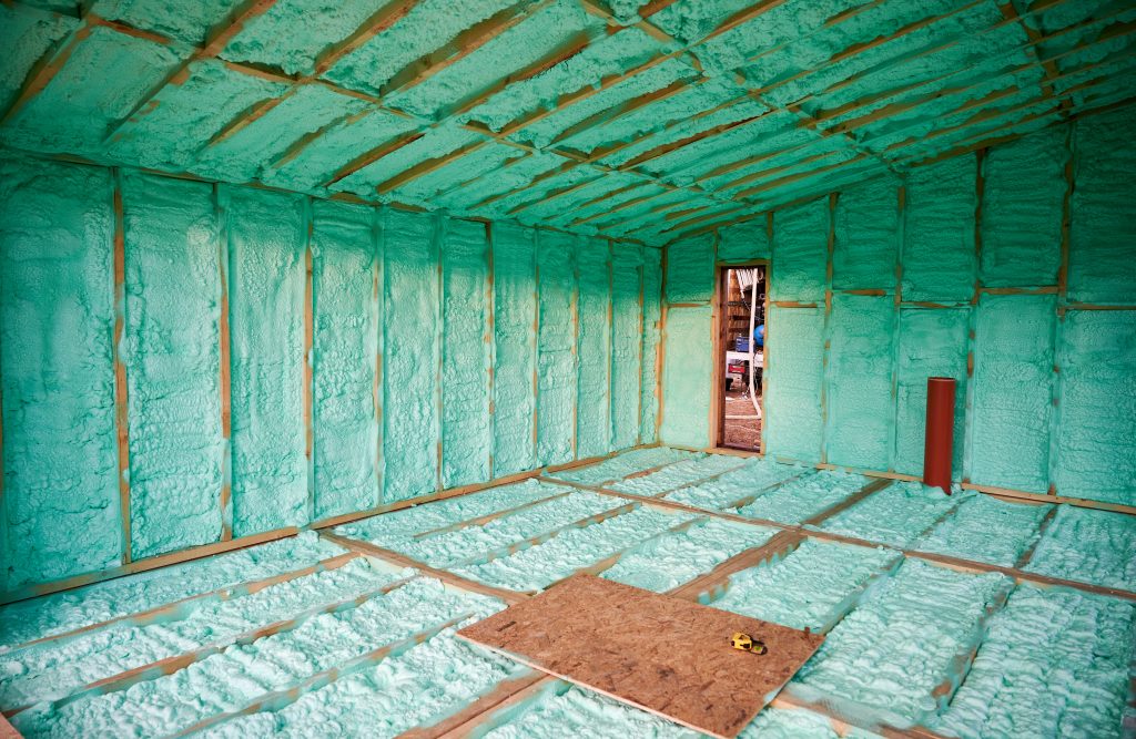 Wooden frame house insulated by polyurethane foam.